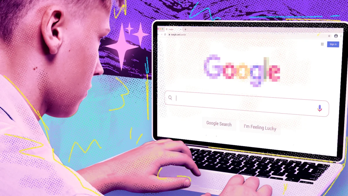 Boy looks at Google search box on a laptop.