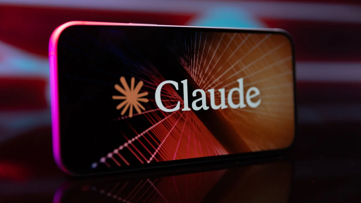 claude logo and name appears on a smartphone screen with colorful lights in background